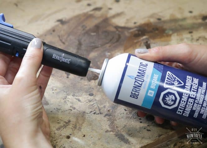 How to put butane in hand torch